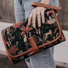 Oi_Oi_Change_Mat_Clutch_-_Jungle_Black_Tan_2_41977951-4465-4a39-8bfb-08e1e3c343f6.jpg